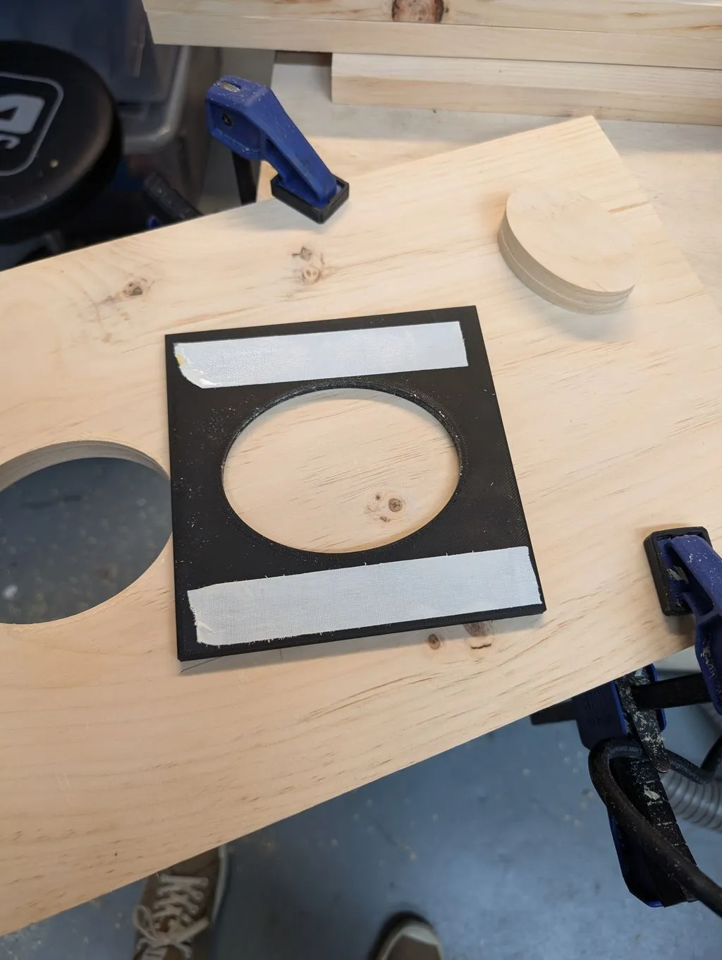 The router template with double-sided tape on the back